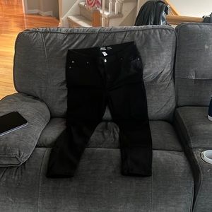 Brand new without tags black skinny jeans size 14.